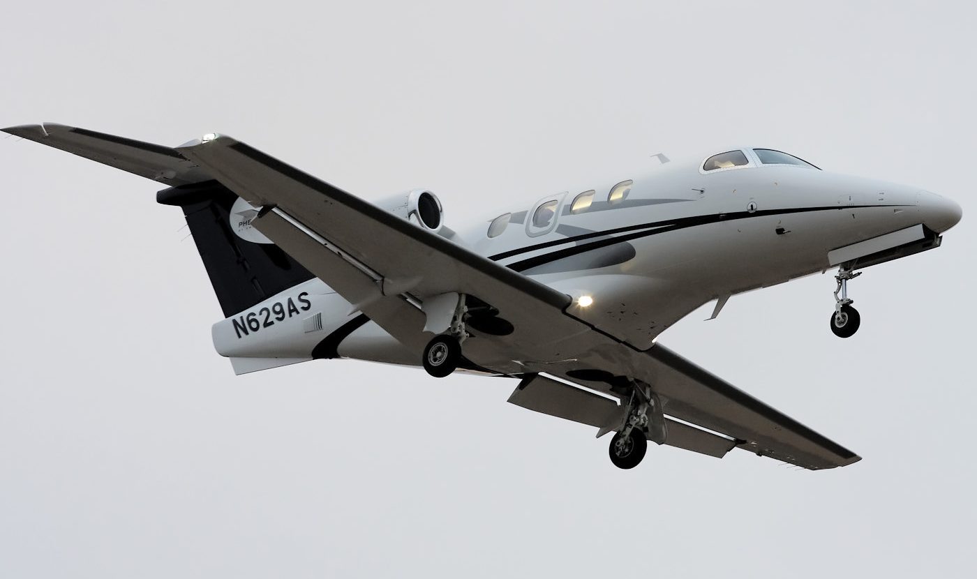 Embraer Phenom 100EV flying